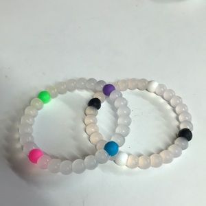 Set of Two Lokai Transparent Bracelets.